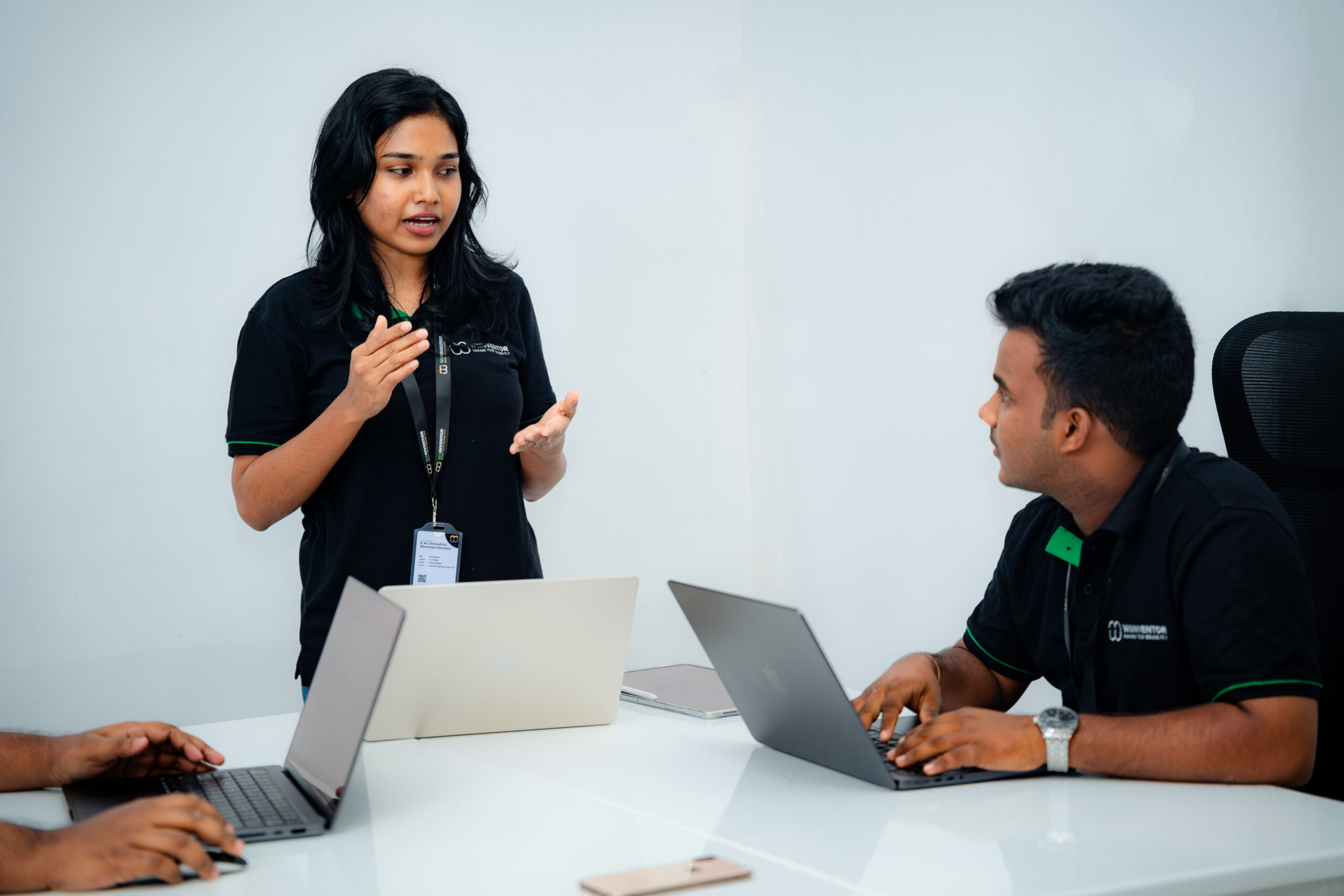 W3Inventor marketing strategist presenting a digital campaign plan to a teammate in the Pannipitiya - Colombo office